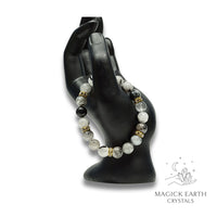 Tourmilated Quartz Crystal Bracelet with 10mm round beads, stretch finish for amplified protection