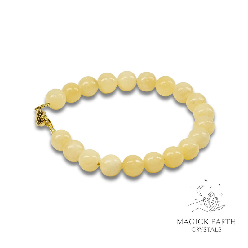 Yellow Jade Crystal Bracelets With 8mm Round Beads Gold Clasp For Balanced Confidence