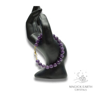 Amethyst Crystal Bracelet with 8mm round beads gold finish for sacred stillness
