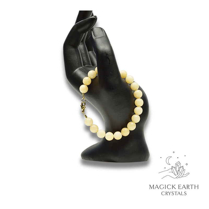 Yellow Jade Crystal Bracelet with 8mm round beads, gold clasp for balanced Confidence