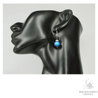 Natural agate druzy earrings with blue electroplated finish showing crystal formation view e