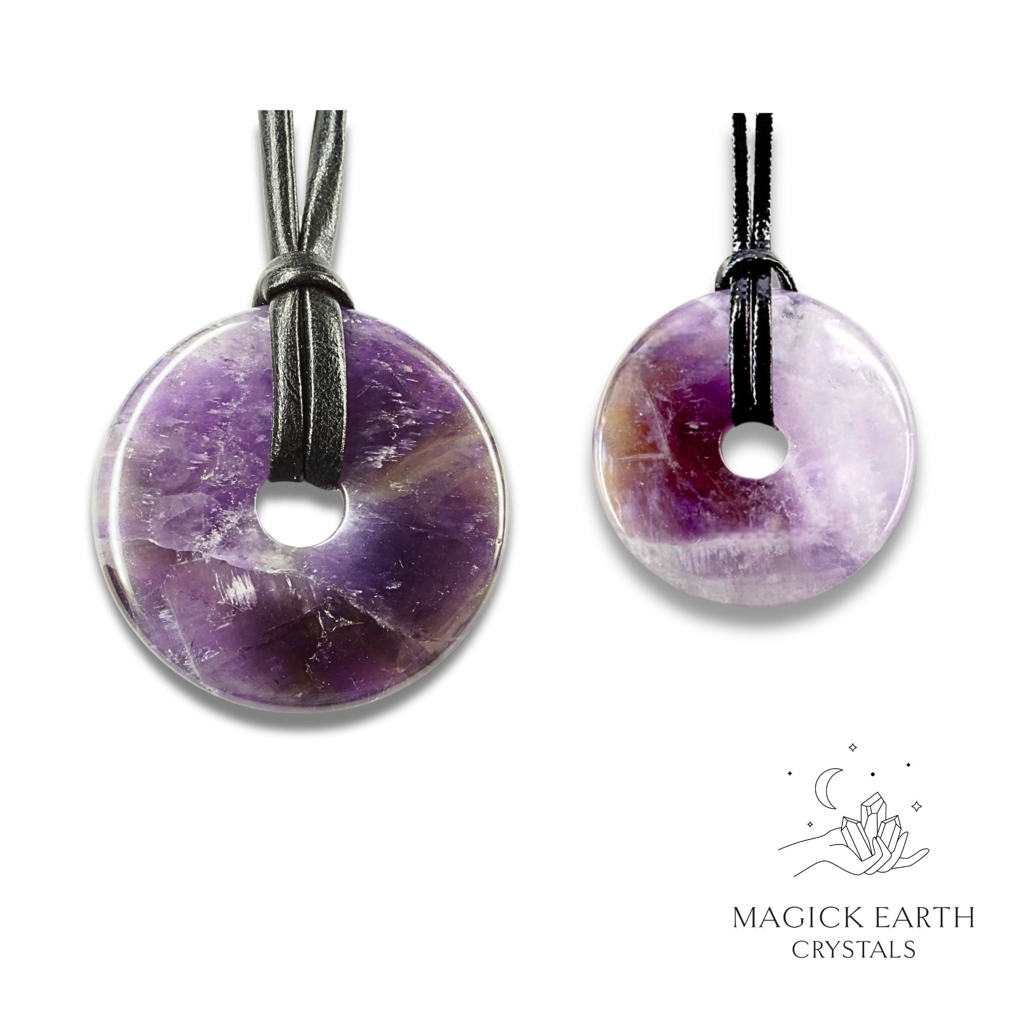 Natural amethyst donut pendants in two sizes hanging from black vegan cords arranged left to right from large to small