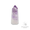 Amethyst crystal tower on a white background with 'Magick Earth Crystals' logo for Sacred Stillness