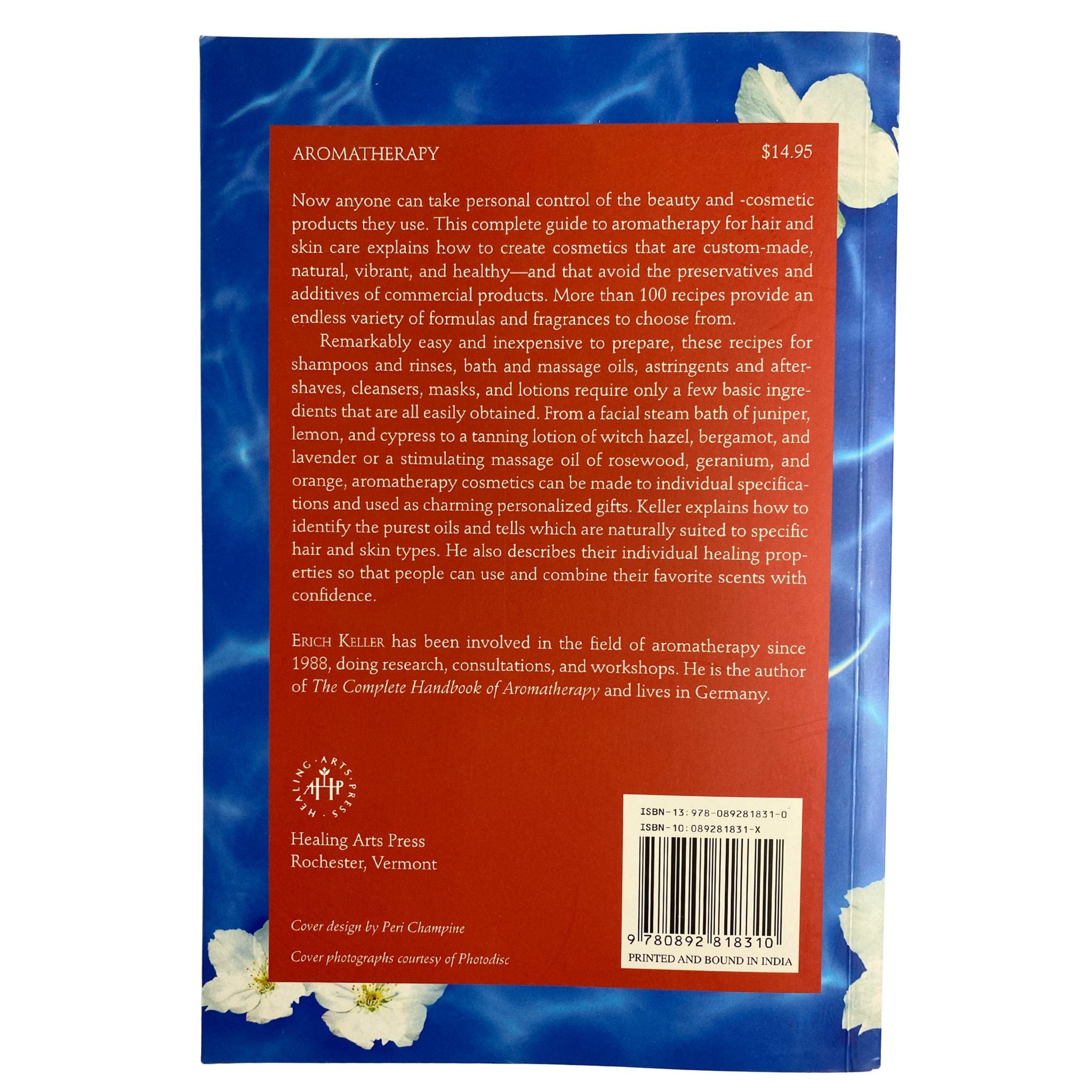 Back  cover of 'Aromatherapy Handbook for Beauty, Hair, and Skin Care' by Erich Keller with floral design on a blue background.