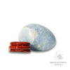 Blue Calcite Crystal Egg Horizontal view with Stand for Expansive Clarity