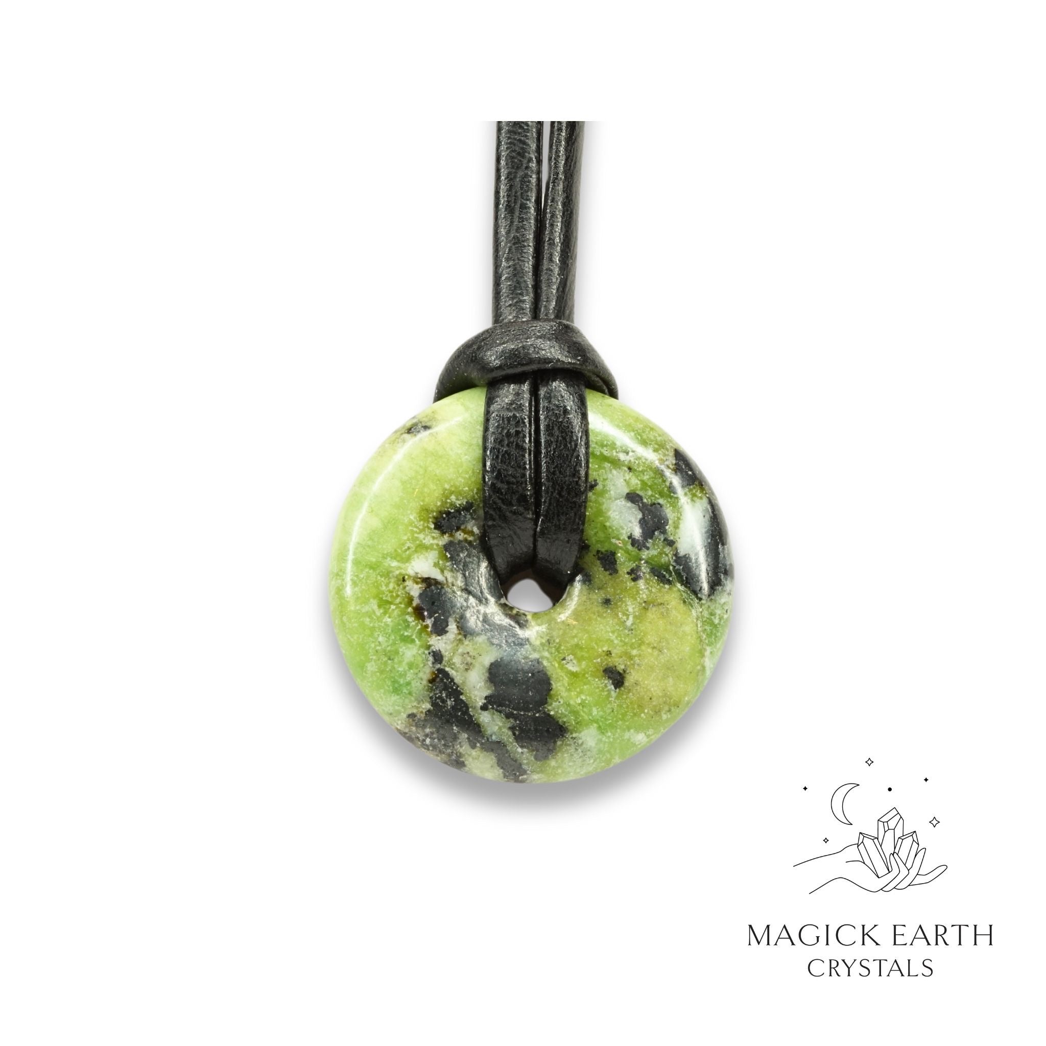 Natural 30mm chrysoprase donut pendant   hanging from a black vegan cord.