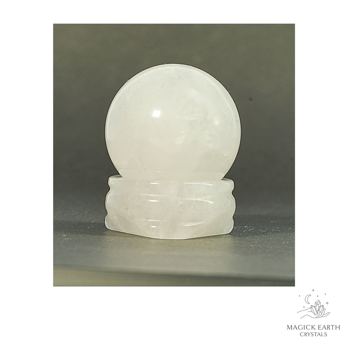 Natural Clear Quartz crystal sphere with clear quartz stand view a