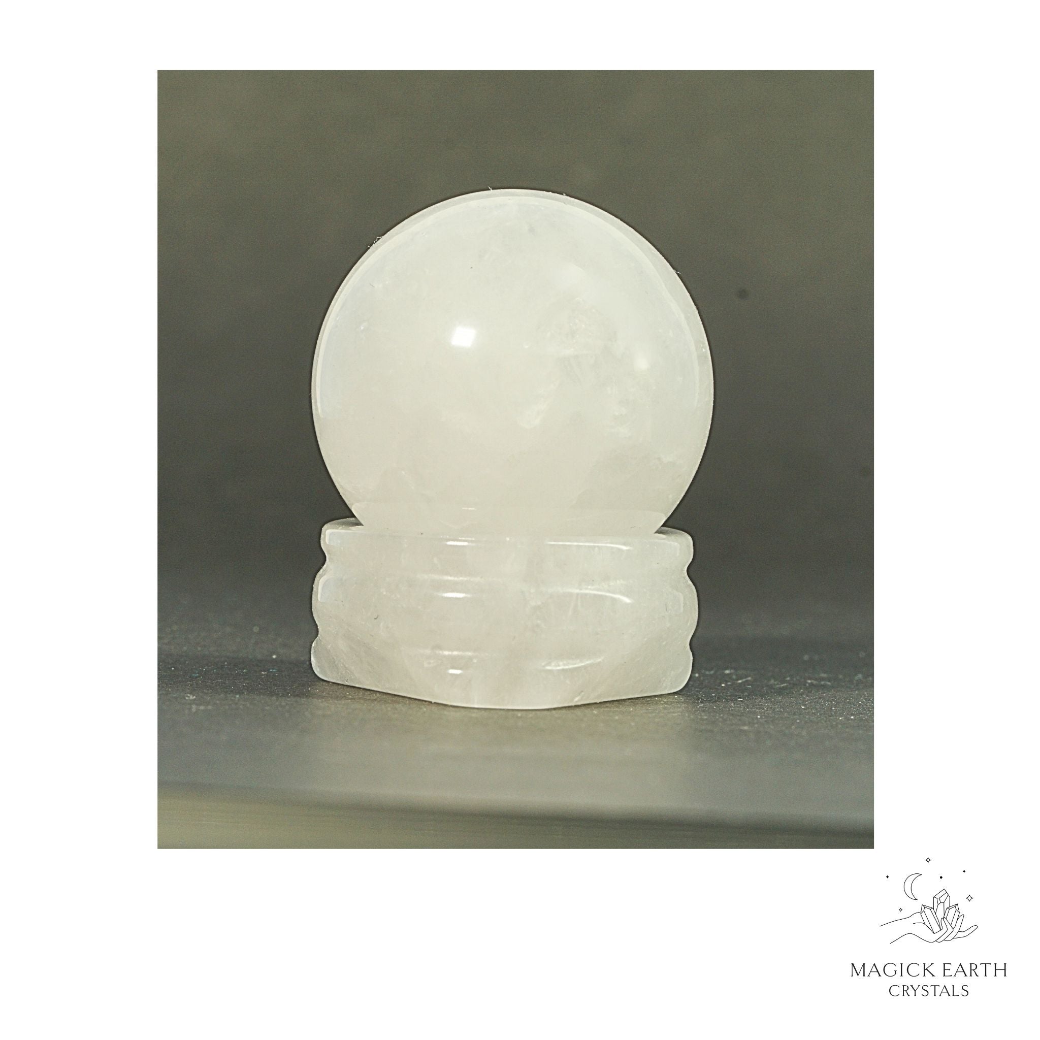 Natural Clear Quartz crystal sphere with clear quartz stand view a