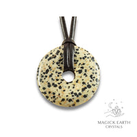 Natural Dalmatian Jasper crystal donut view a