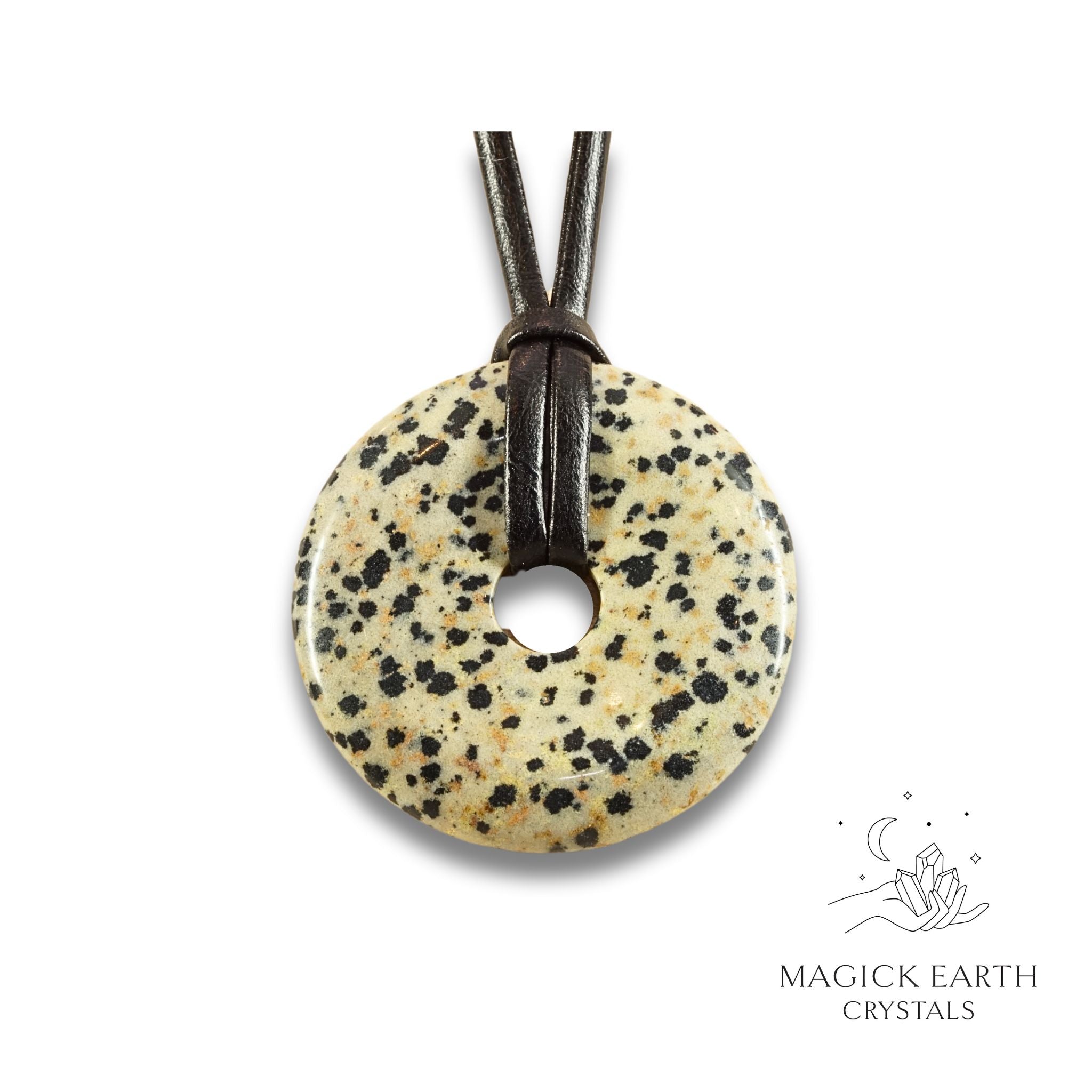 Natural 50mm Dalmatian jasper donut pendant hanging from a black vegan cord.