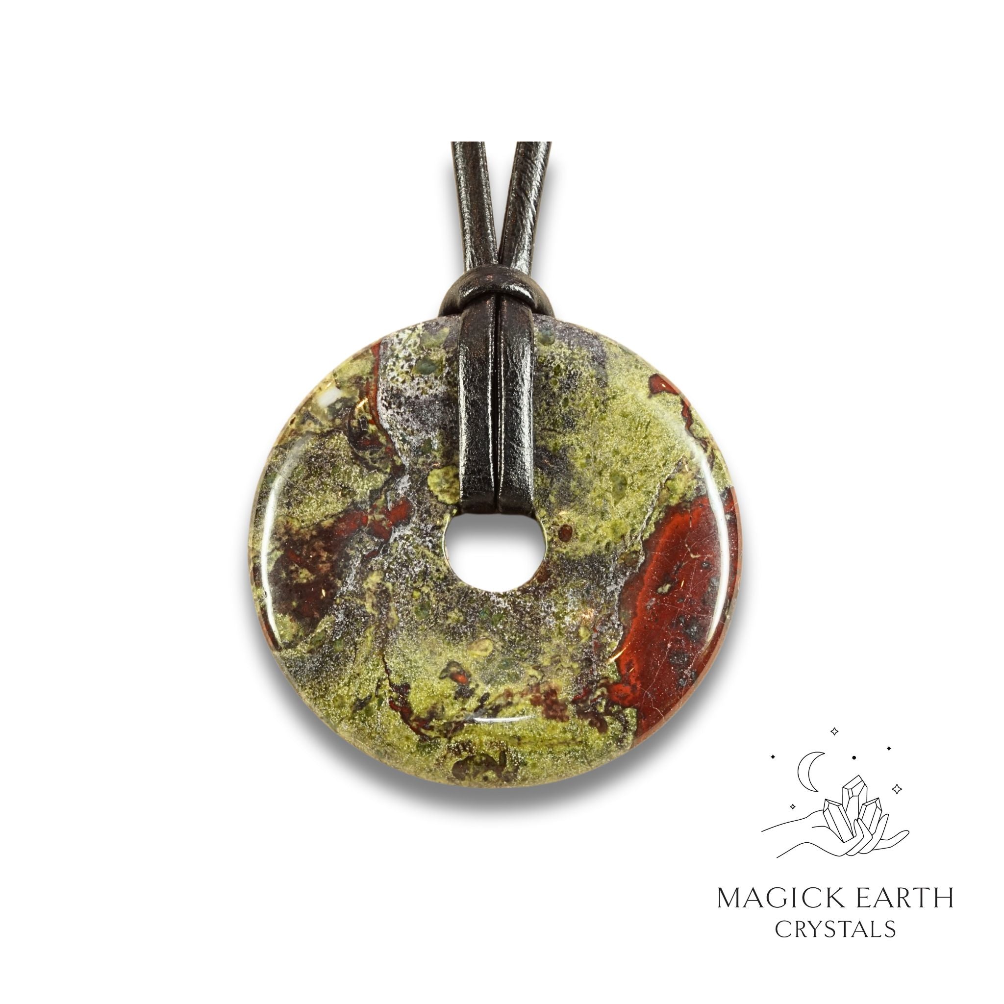Natural 50mm dragons blood jasper donut pendant hanging from a black vegan cord.