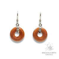 Natural Goldstone crystal donut earrings view b