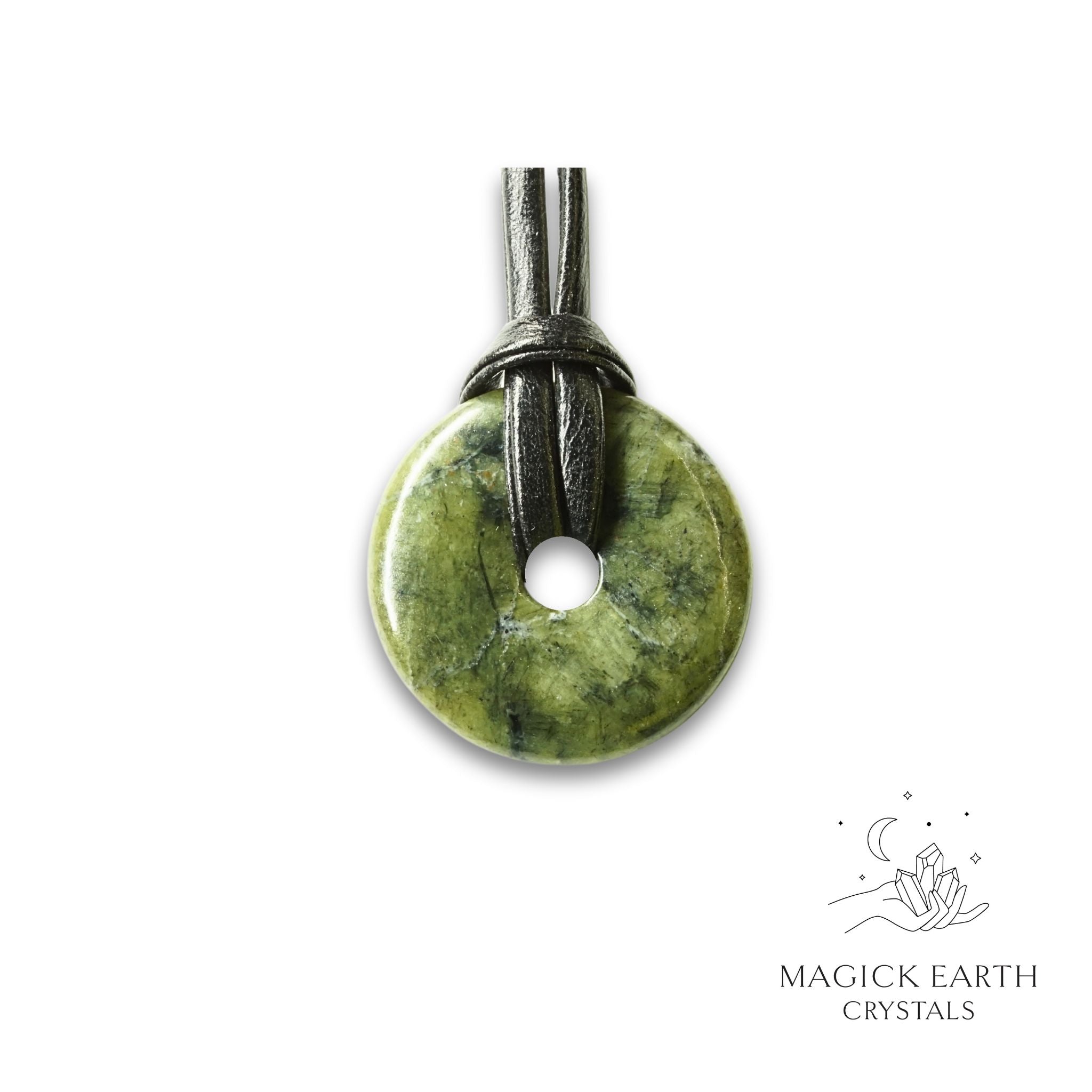 Natural 30mm jade donut pendant hanging from a black vegan cord.