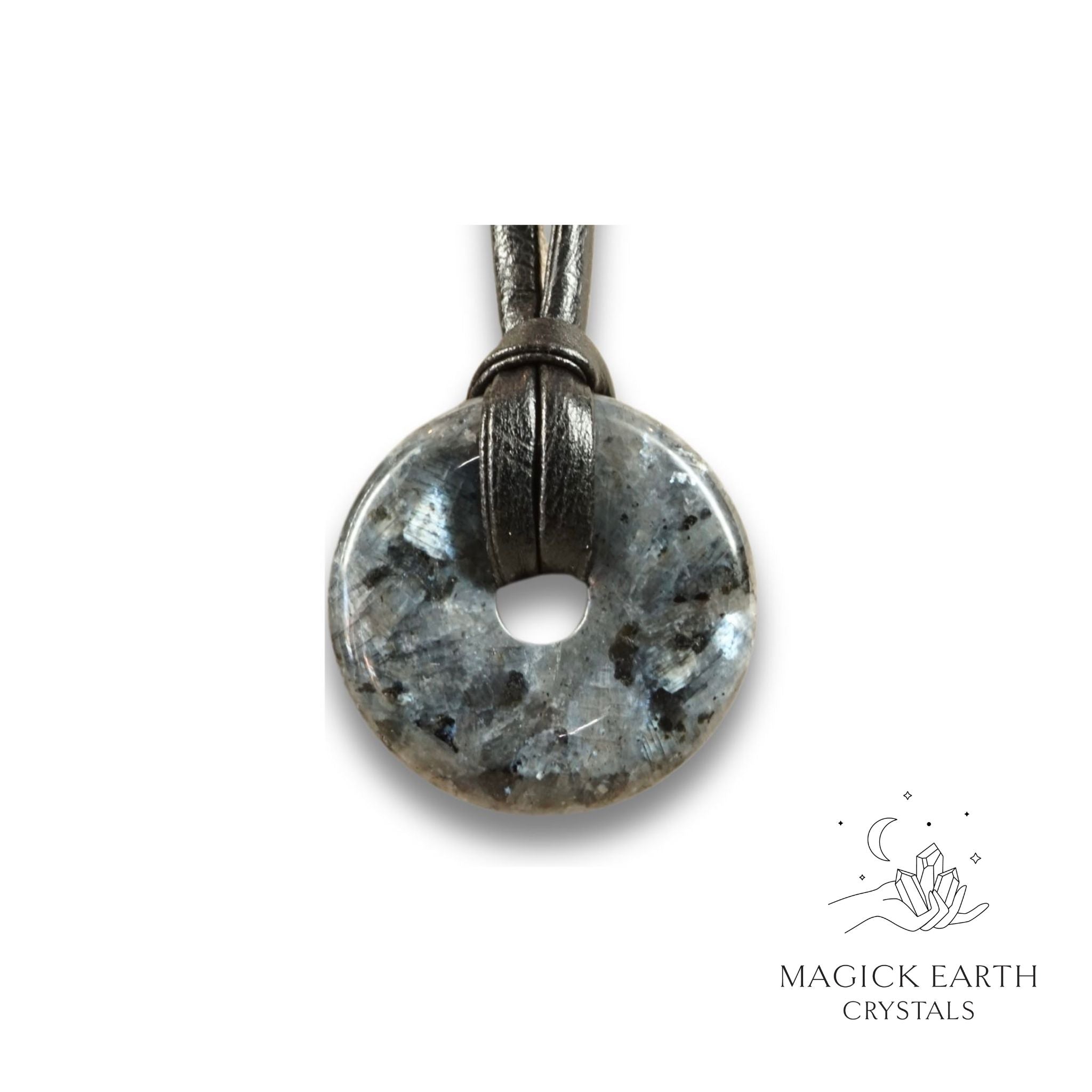 Natural 30mm larvikite donut pendant hanging from a black vegan cord.