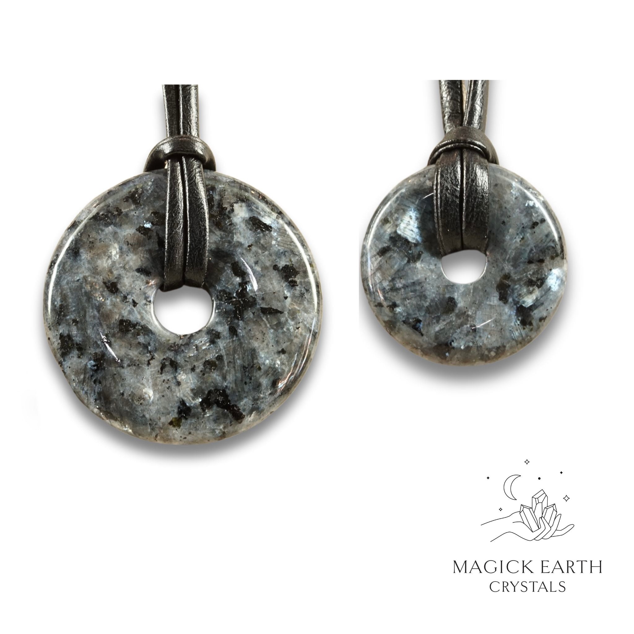 Natural larvikite donut pendants in two sizes hanging from black vegan cords arranged left to right from large to small
