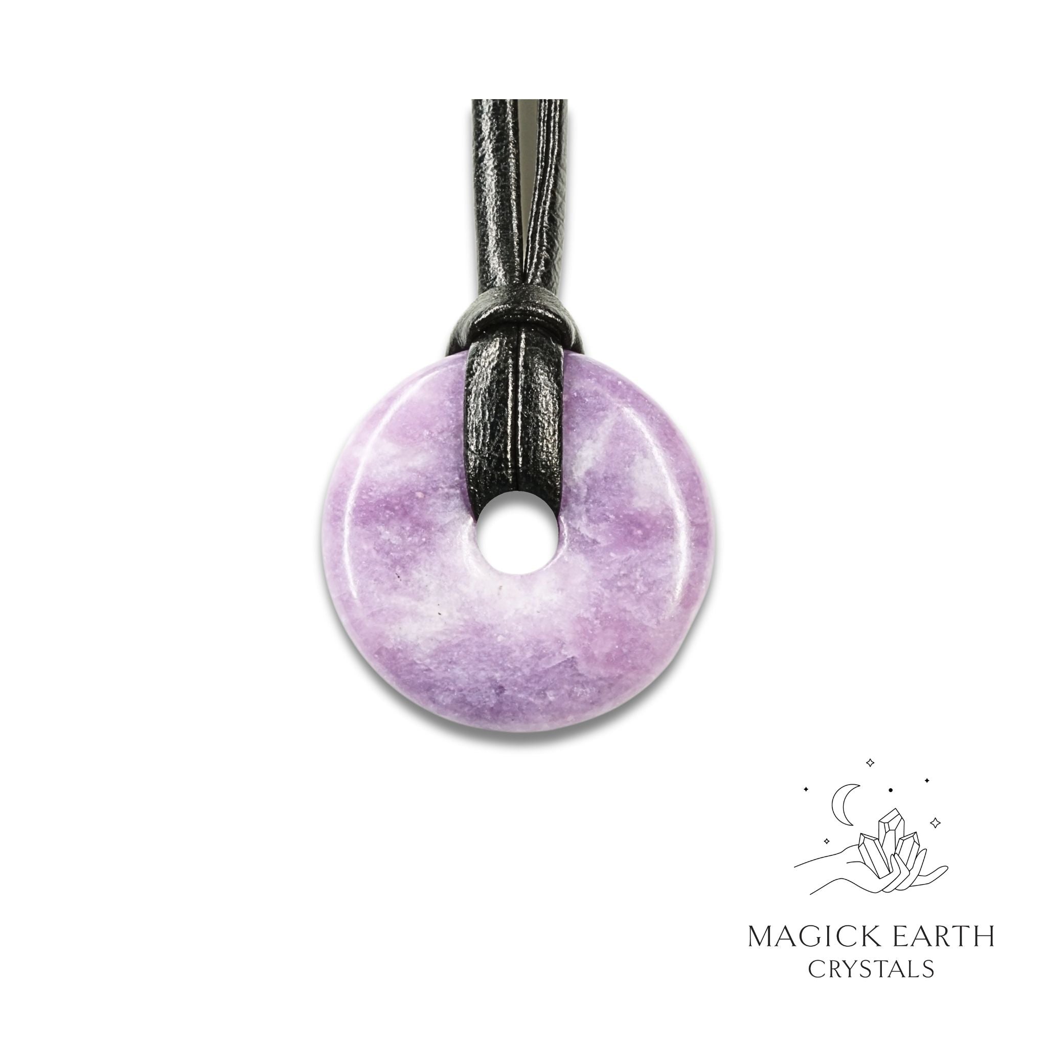Natural 30mm lepidolite donut pendant hanging from a black vegan cord.