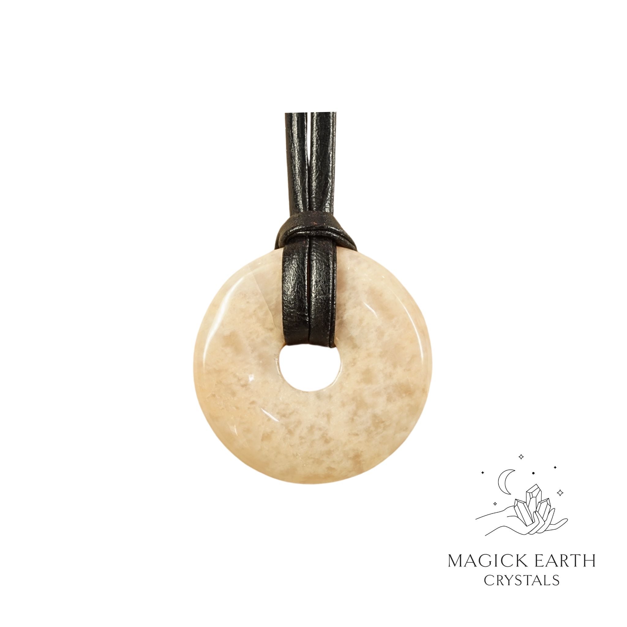 Natural 30mm moonstone donut pendant hanging from a black vegan cord.