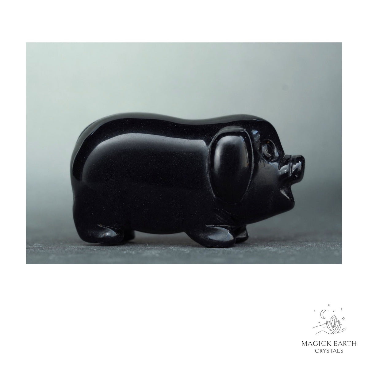 Natural Obsidian crystal pig figurine view a