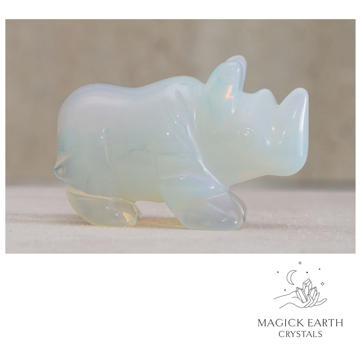Natural Opalite crystal rhinoceros figurine view a
