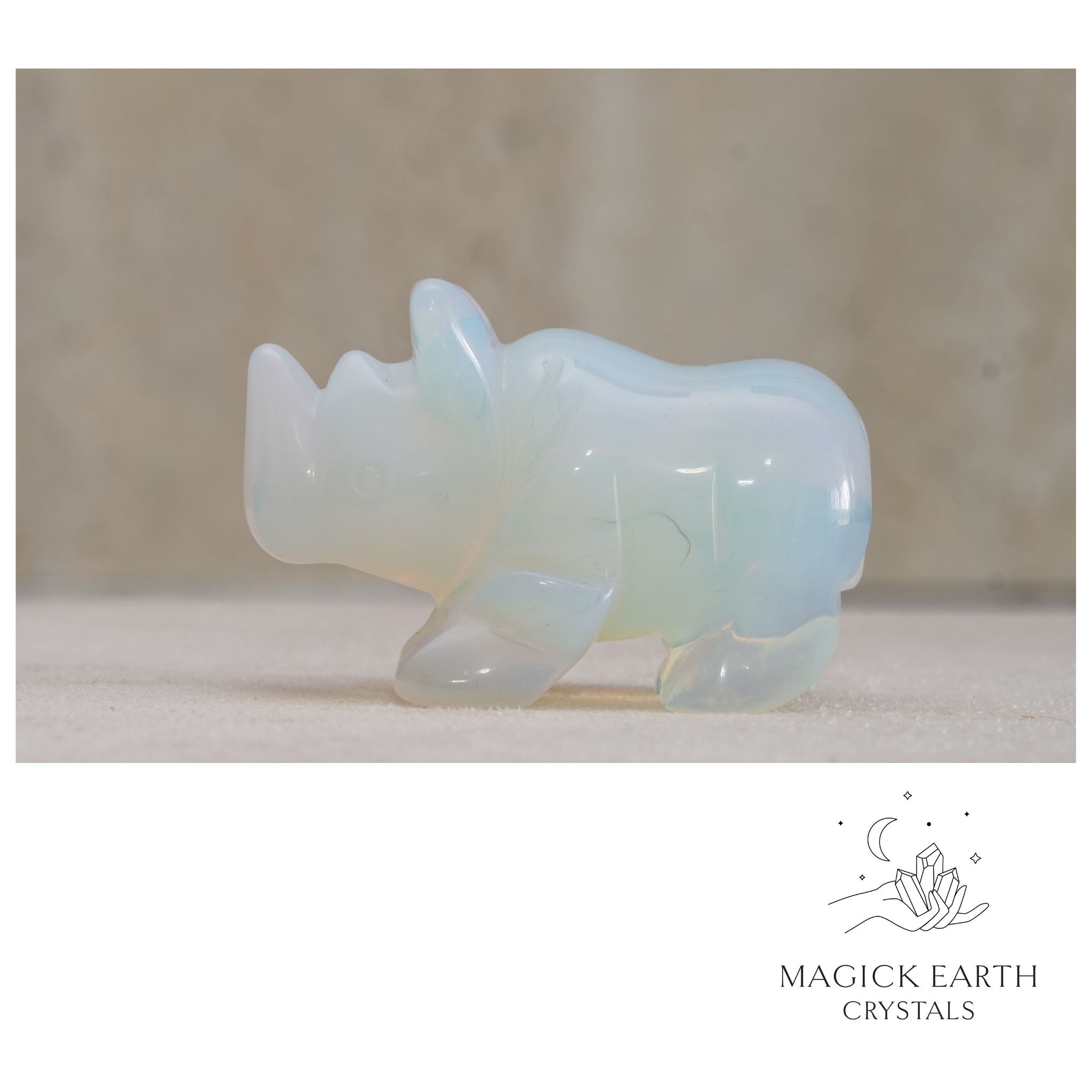 Natural Opalite crystal rhinoceros figurine view b