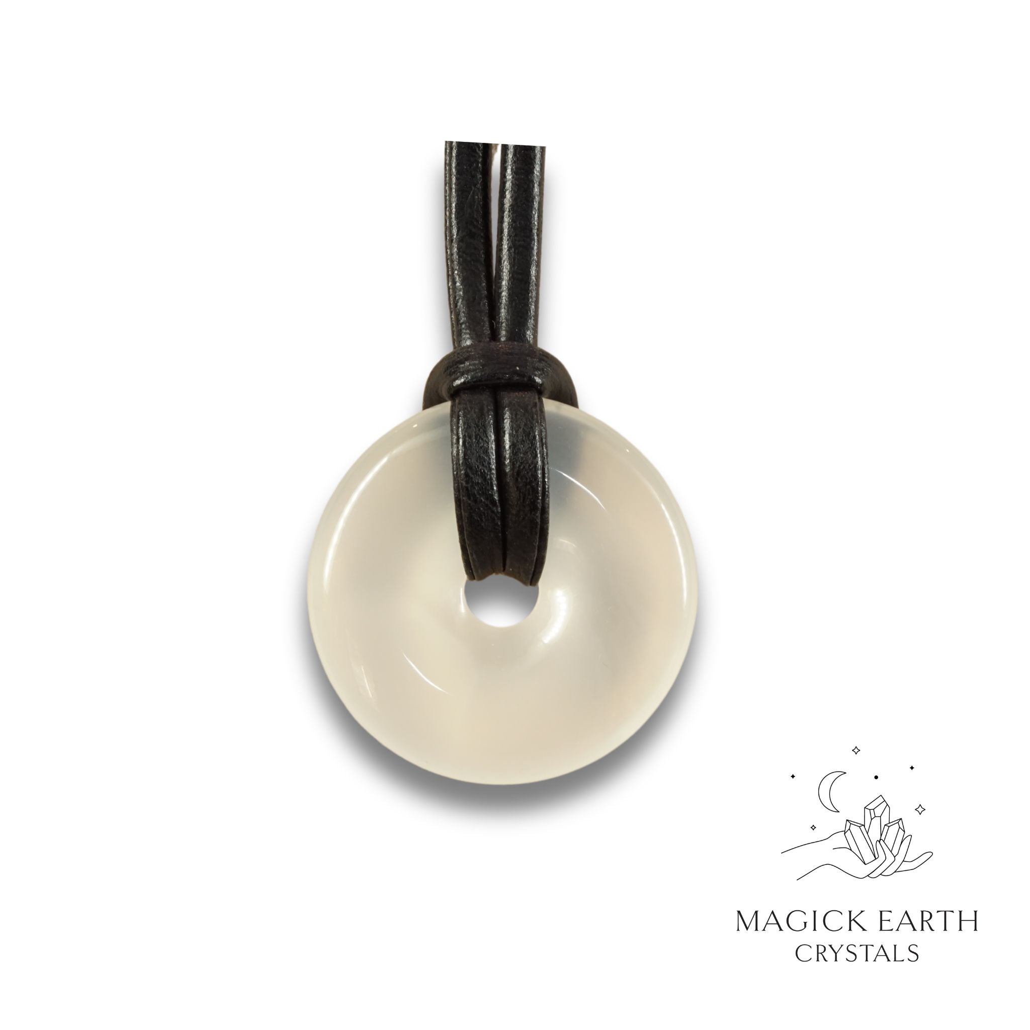 Natural 30mm opaque agate donut pendant hanging from a black vegan cord.
