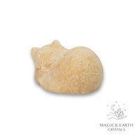 Natural Orange Calcite sleeping cat figurine view c