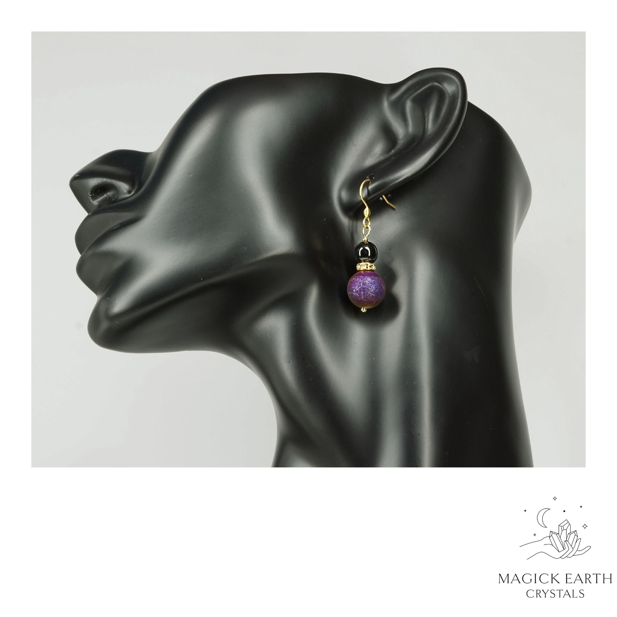 Purple Electroplated Druzy Geode and Obsidian Earrings With Gold Finish On Display Head