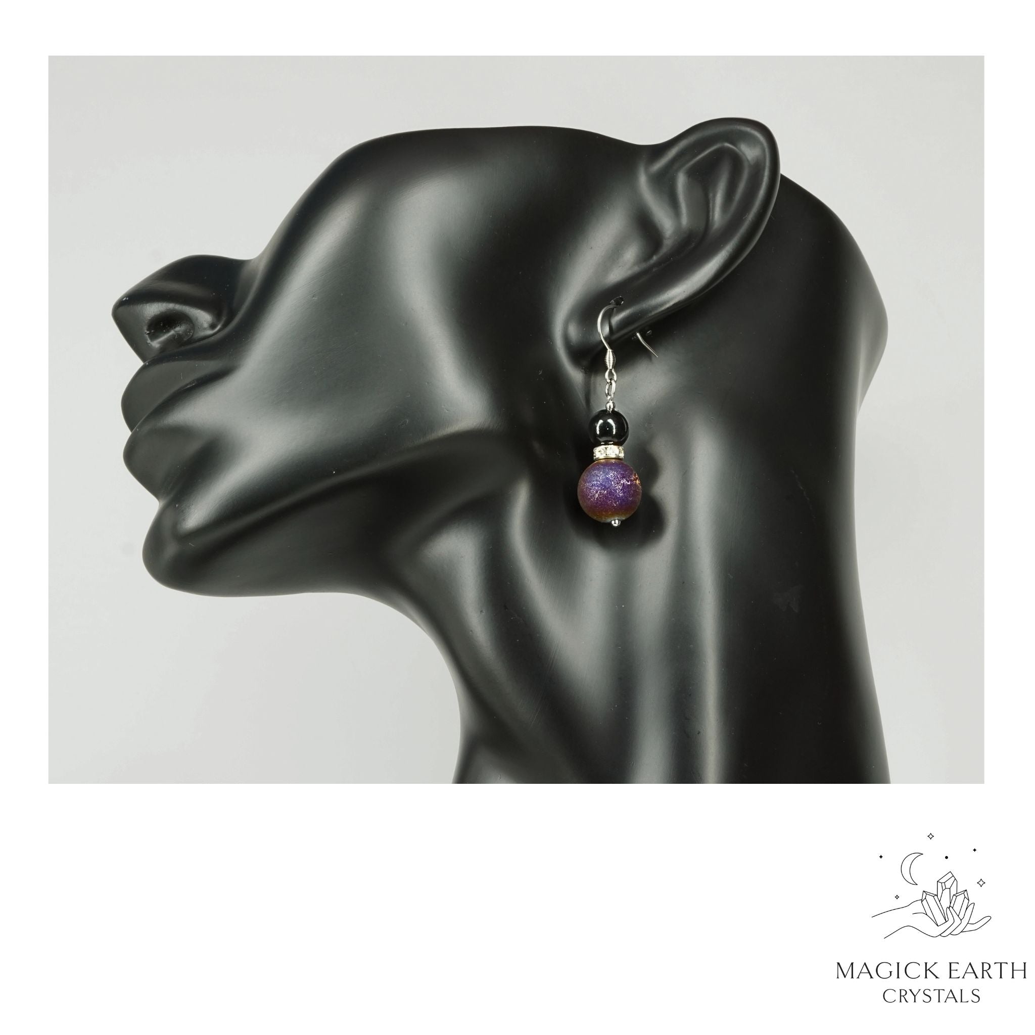 Teal Electroplated Druzy Geode and Obsidian Earrings With Platinum Finish On Display Head