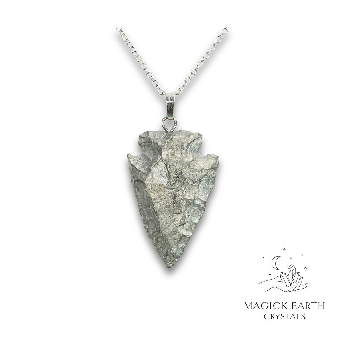 Quartz arrowhead pendant with electroplated platinum finish front view
