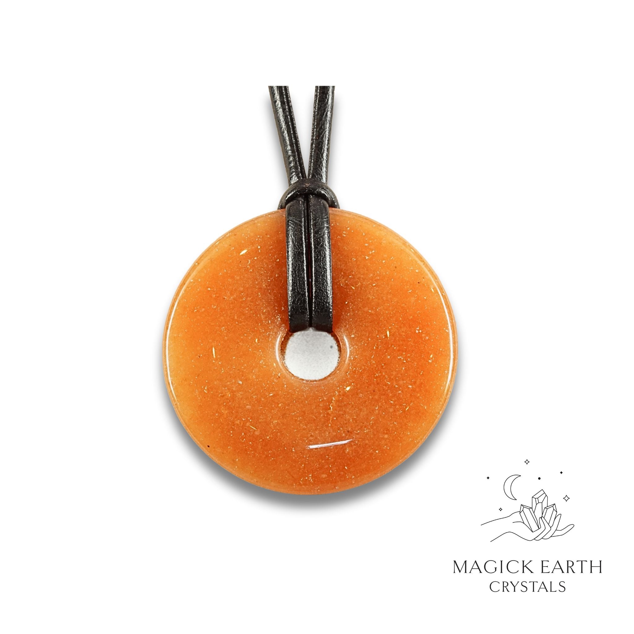 Natural 50mm red aventurine donut pendant hanging from a black vegan cord.