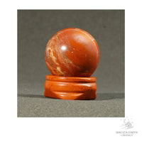Natural Red Jasper crystal sphere with Red Jasper Stand view a