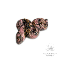 Natural Rhodonite crystal extended snake figurine view b