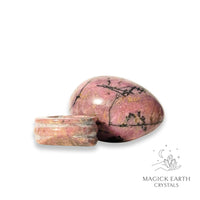 Rhodonite Crystal Egg With Matching Stand Horizontal View For Emotional Recovery