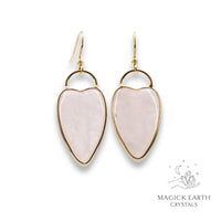 Natural Rose Quartz charmed heart crystal earrings with decorative gold edging view a