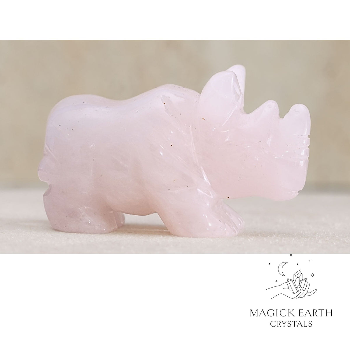 Natural Rose Quartz crystal rhinoceros figurine view a