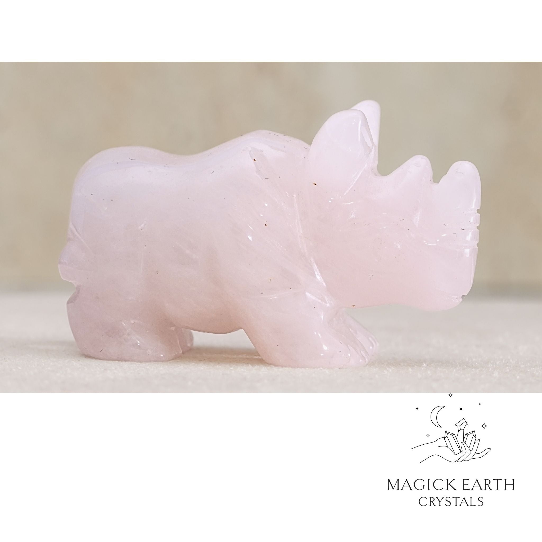 Natural Rose Quartz crystal rhinoceros figurine view a