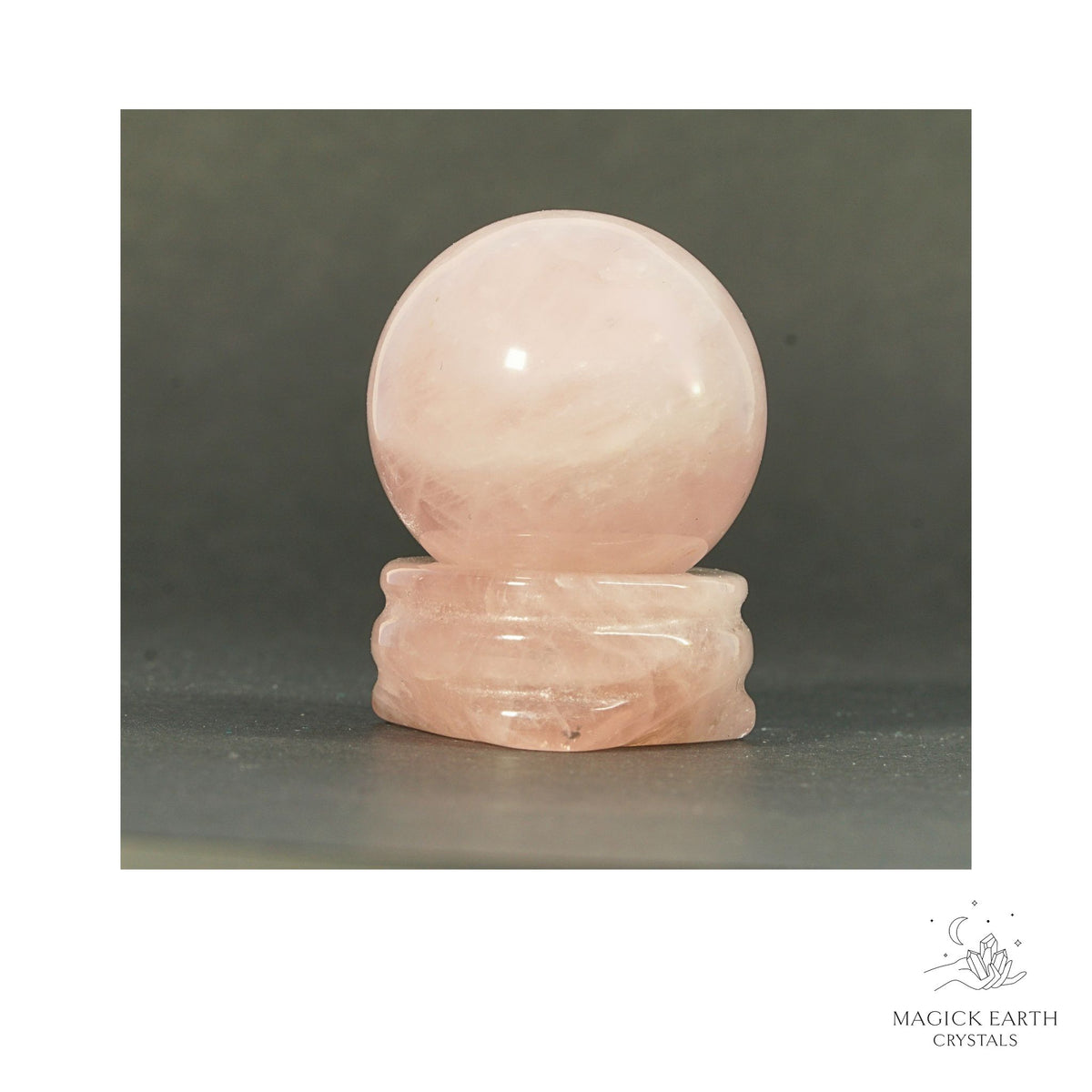 Natural Rose Quartz crystal sphere with rose quartz stand view a