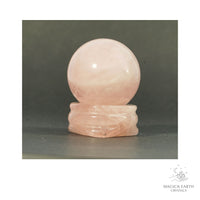 Natural Rose Quartz crystal sphere with rose quartz stand view a