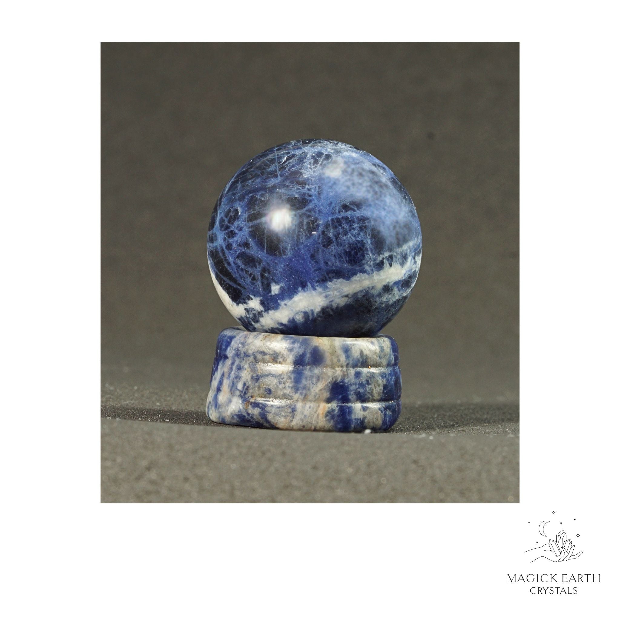 Natural Sodalite crystal sphere with sodalite stand view a