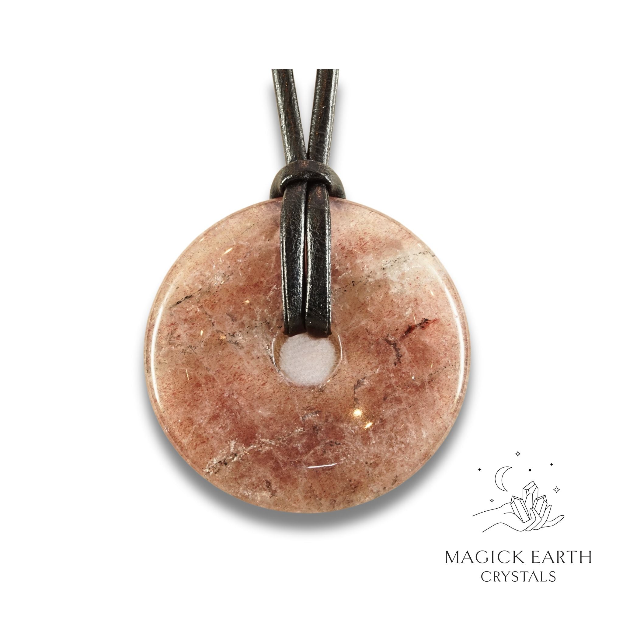 Natural 50mm strawberry quartz donut pendant hanging from a black vegan cord.