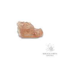 Natural Strawberry Quartz crystal mini dragon skull view c