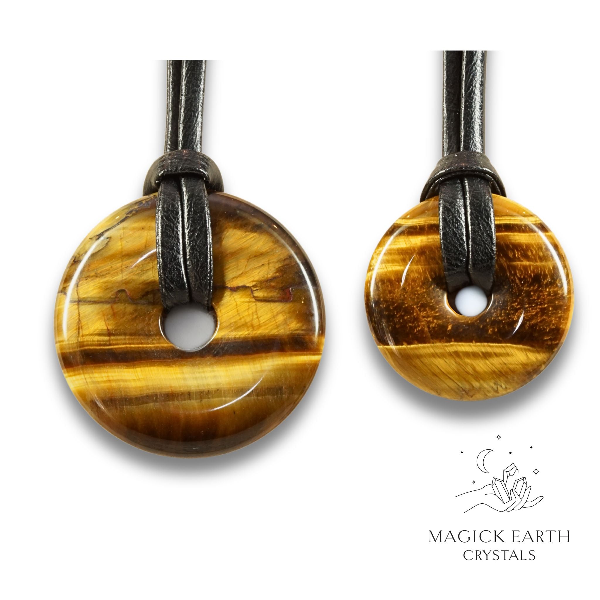 Natural tiger eye donut pendants in two sizes hanging from black vegan cords arranged left to right from large to small