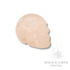 Rose Quartz Crystal Gemstone Carved Skull Left View