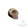 Rhodonite Crystal Gemstone Carved Tiny  Skull Left View