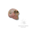 Rhodonite Crystal Gemstone Carved Tiny  Skull Left View