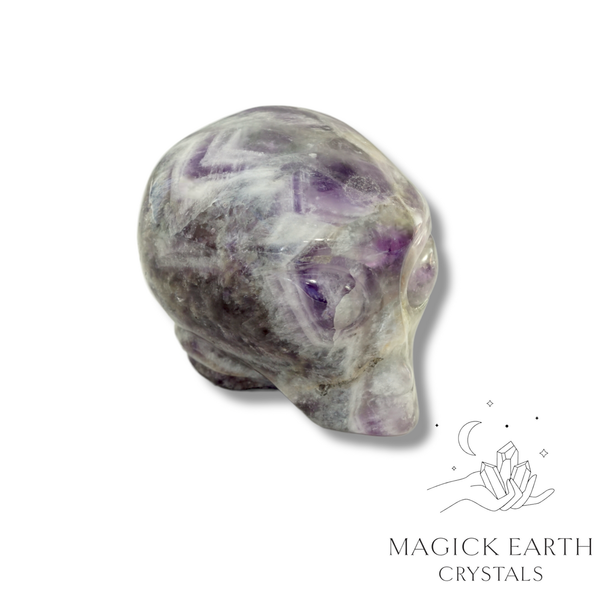 Natural Amethyst crystal alien skull view a