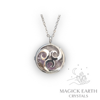 Natural Amethyst triskele diffuser pendant view a