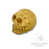 Electroplated druzy quartz skull with gold finish, left view