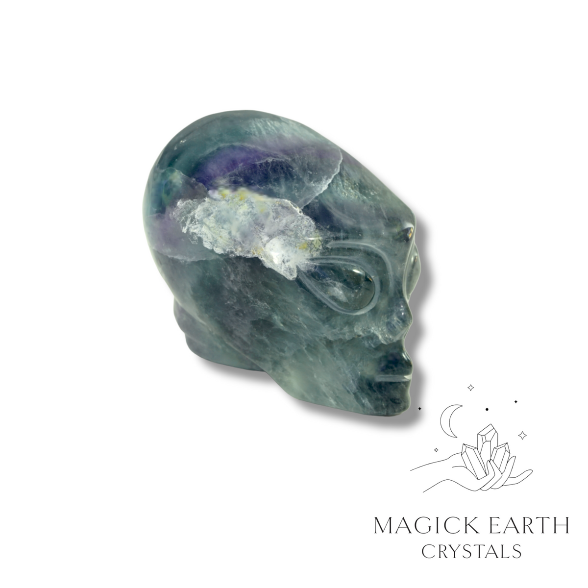Natural Fluorite crystal alien skull view a