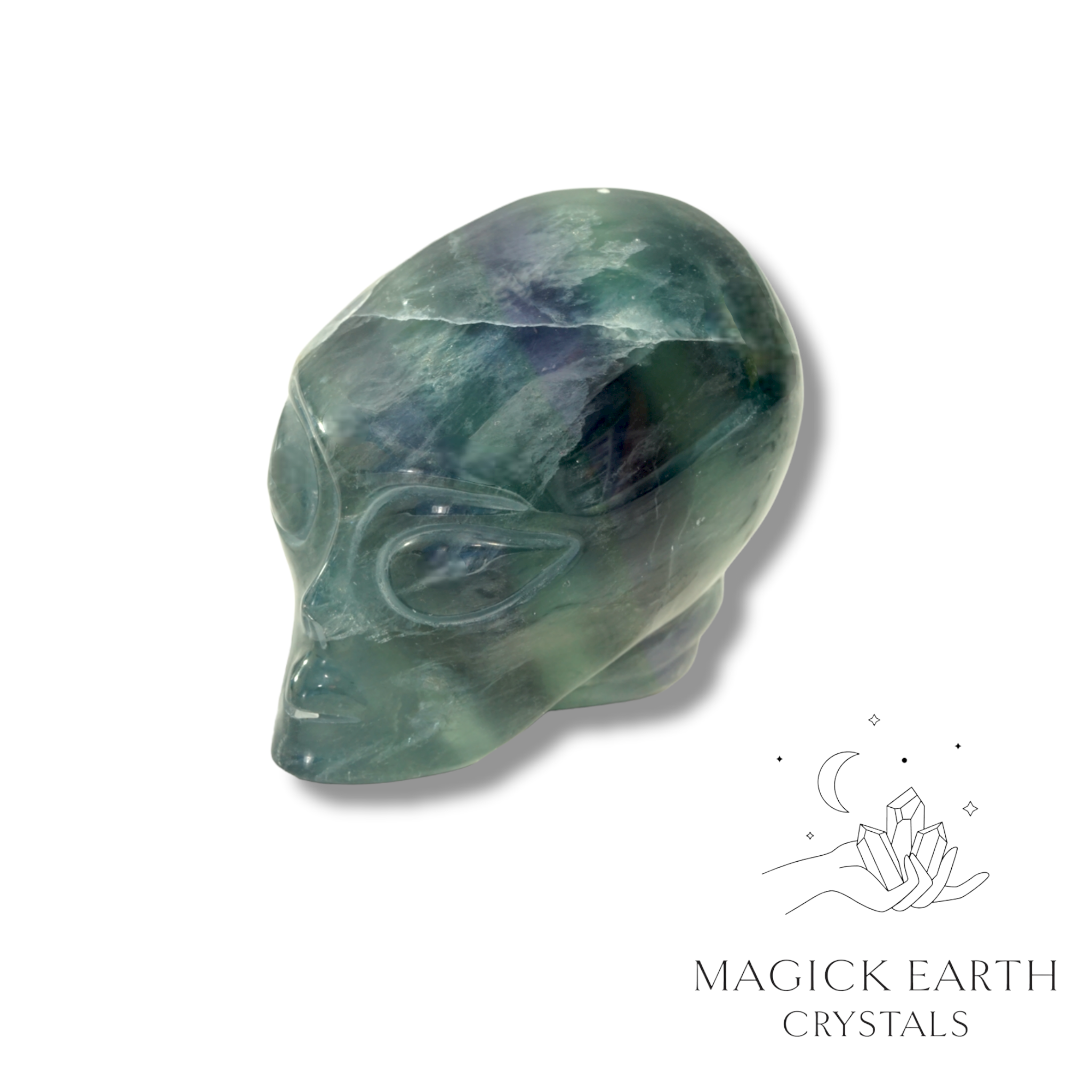 Natural Fluorite crystal alien skull view b